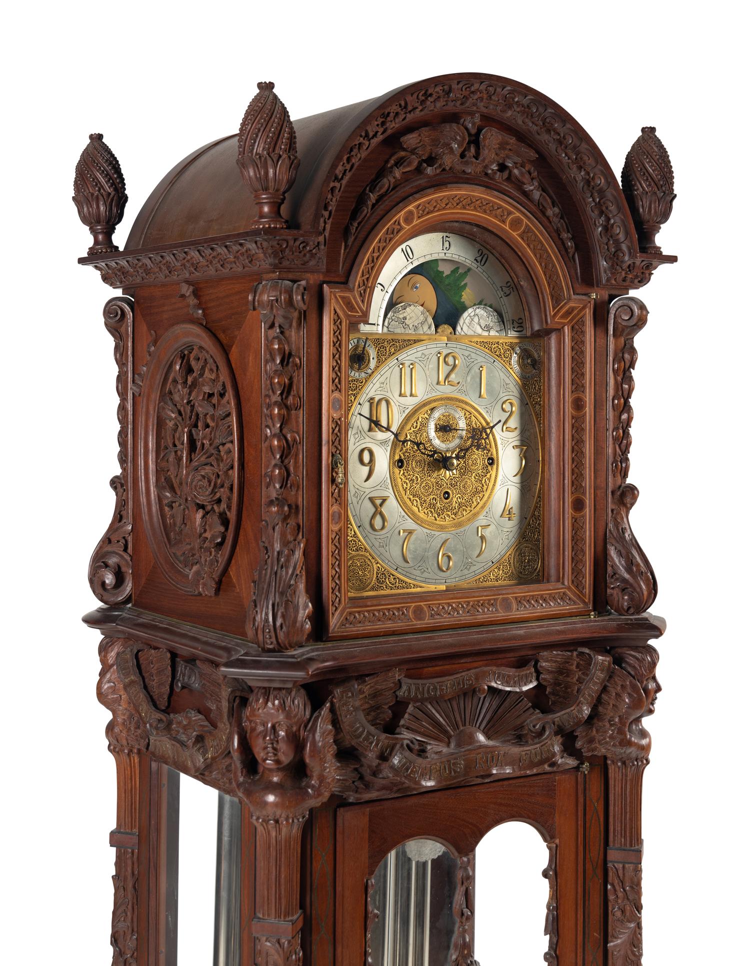 A Renaissance Revival Carved Mahogany Tube-Striking Tall Case Clock