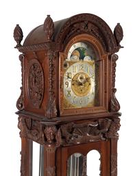 A Renaissance Revival Carved Mahogany Tube-Striking Tall Case Clock
