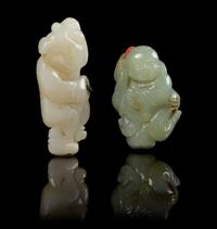 Two Carved Jade Toggles Length of longer 2 1/4 inches.
