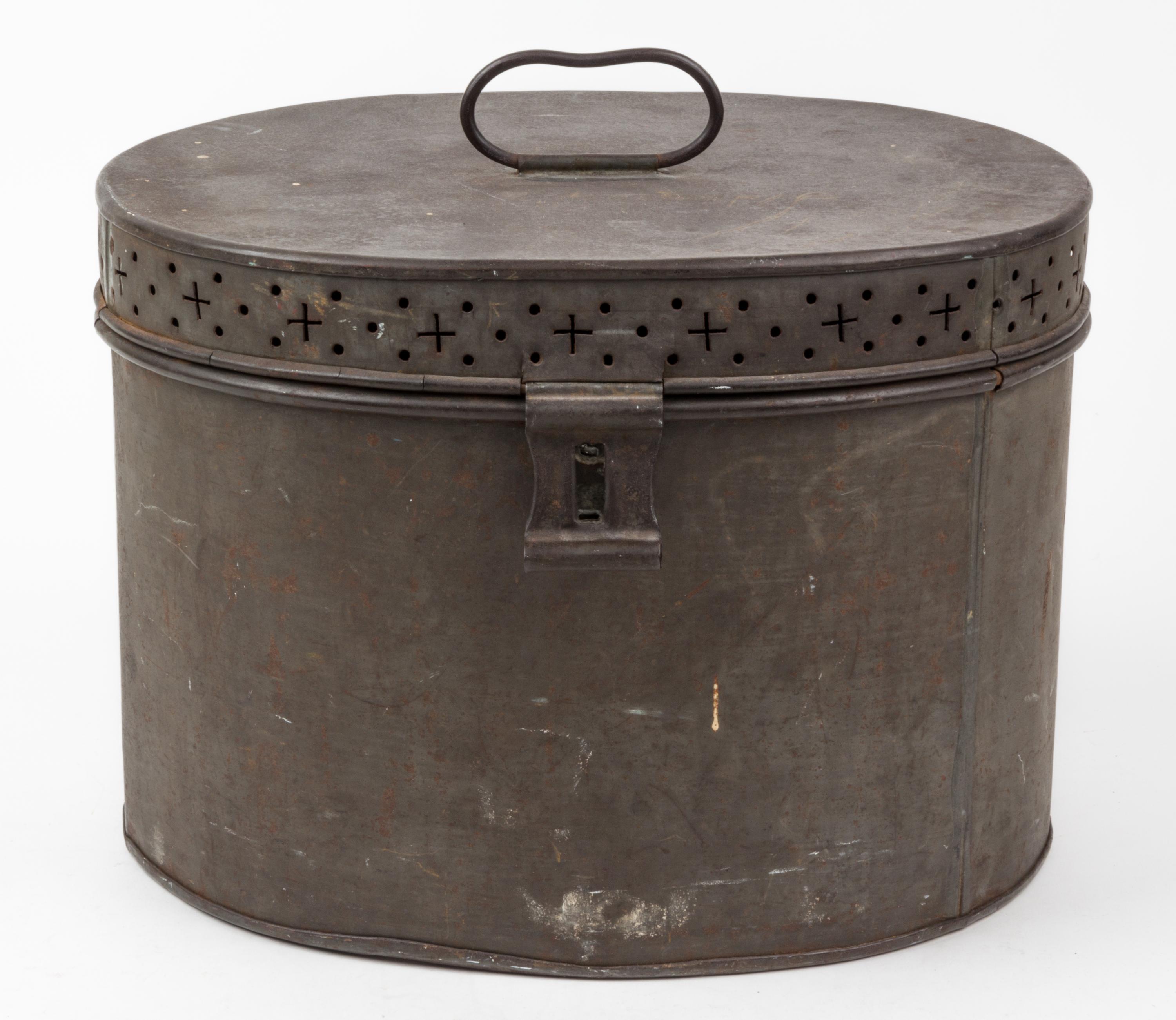 A Covered Aluminum Container Height 9 5/8 inches.