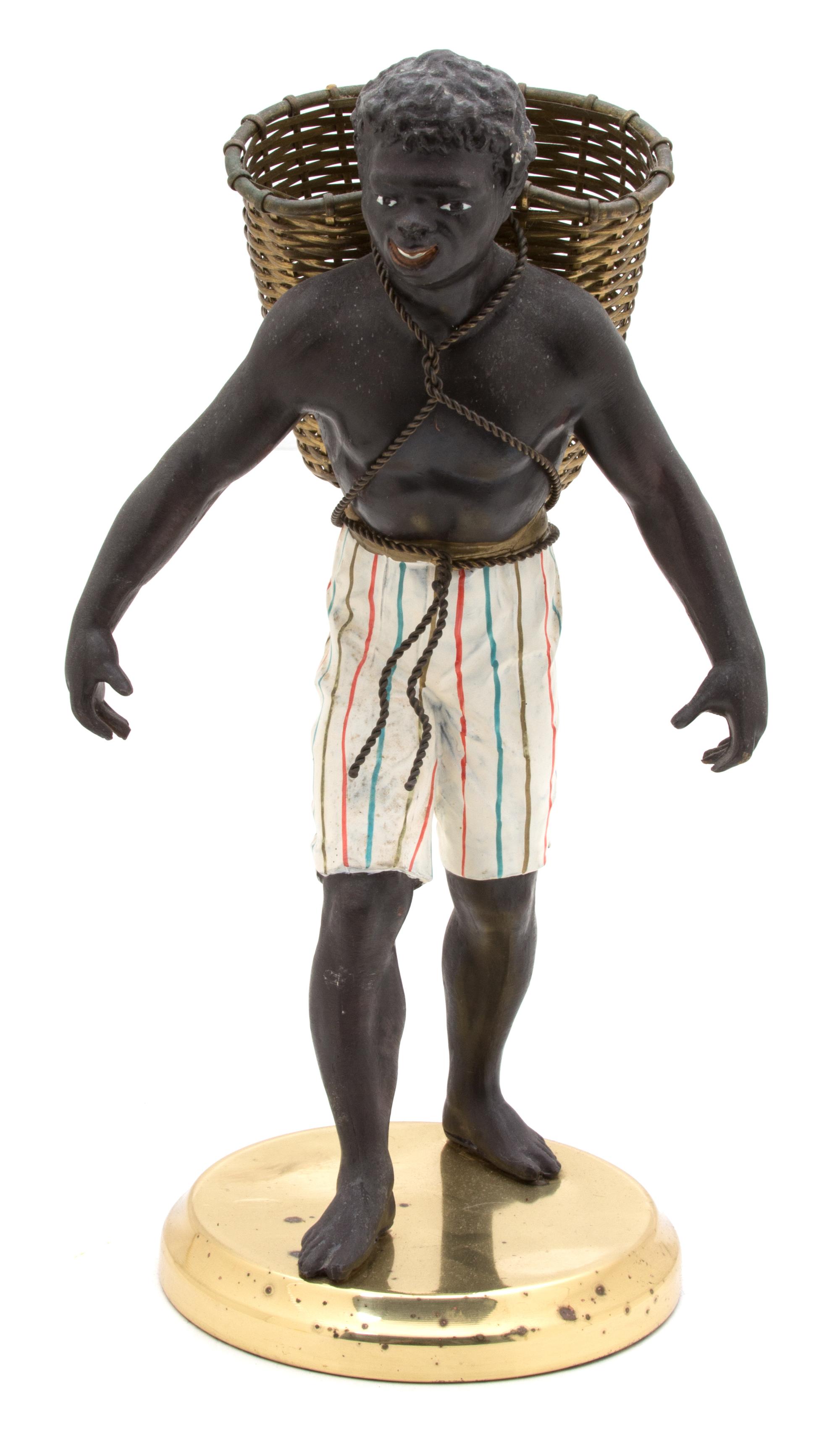 A Painted Blackamoor Figure Height 13 3/4 inches. — 20TH CENTURY