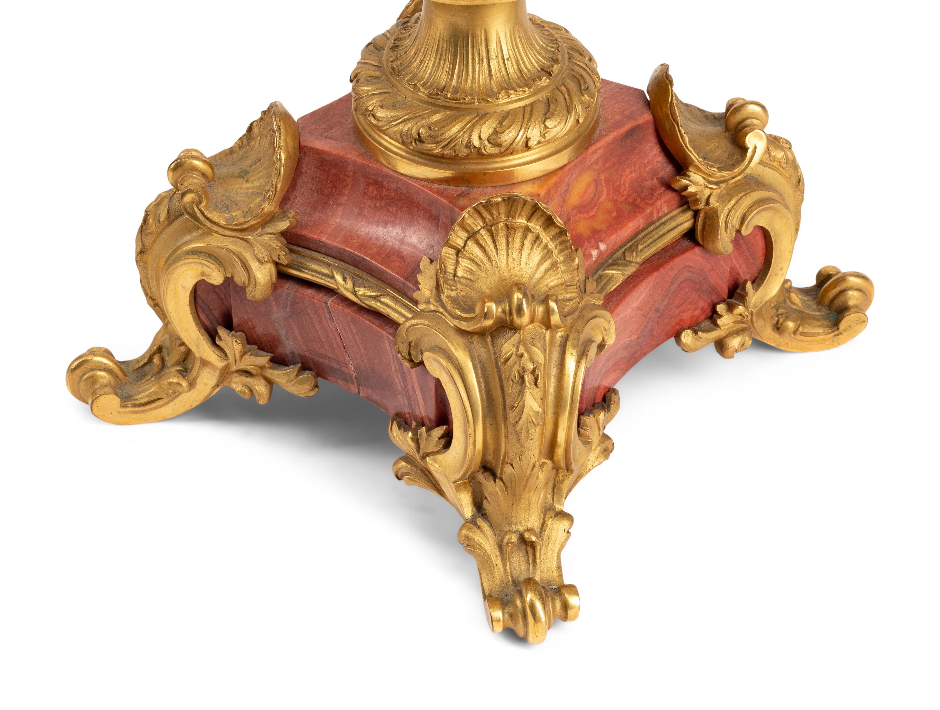 A Pair of French Gilt Bronze and Marble Candelabra