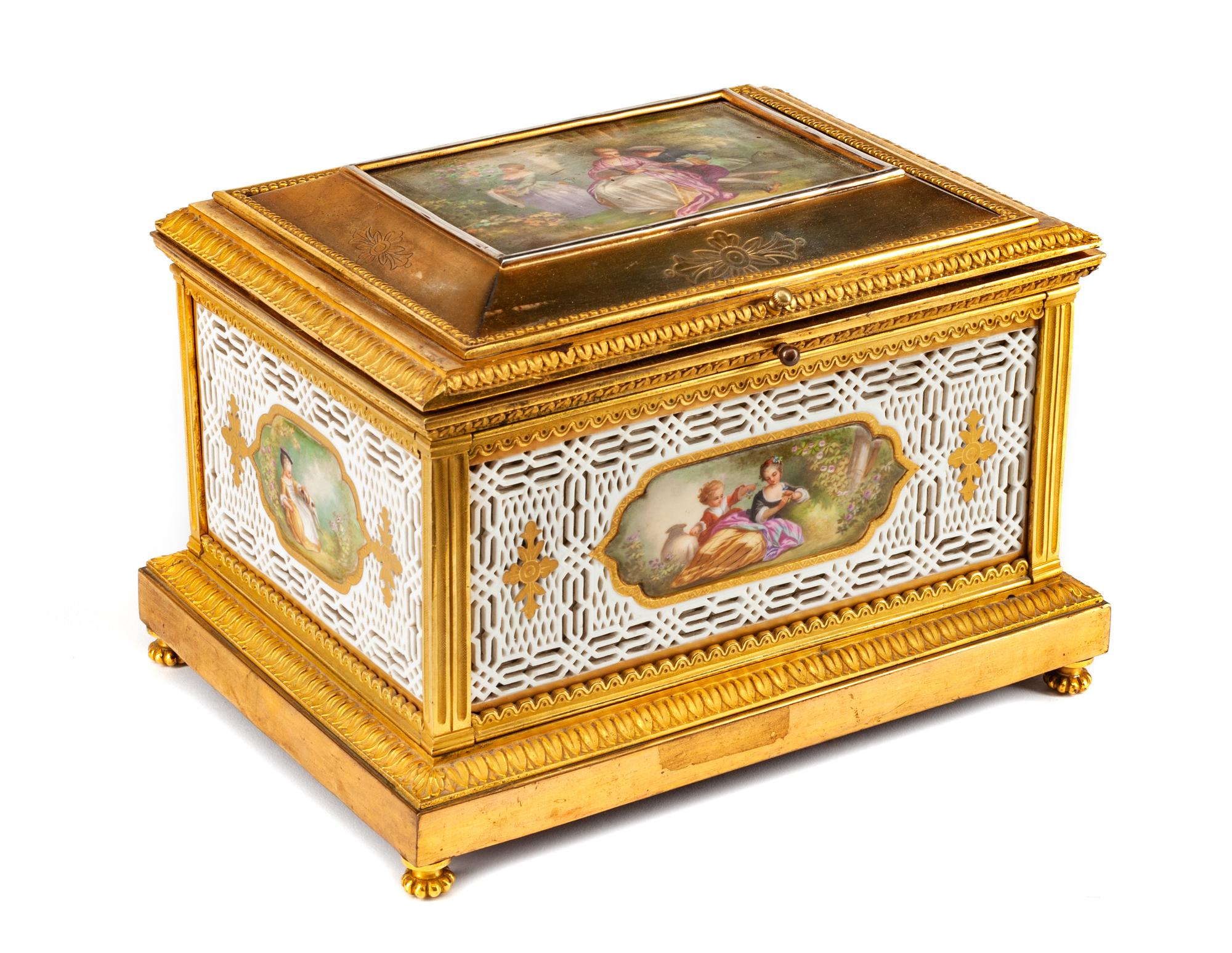 A French Gilt Bronze and Reticulated Porcelain Box