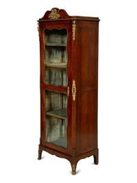 A Louis XV Style Gilt Bronze Mounted Kingwood Vitrine Cabinet