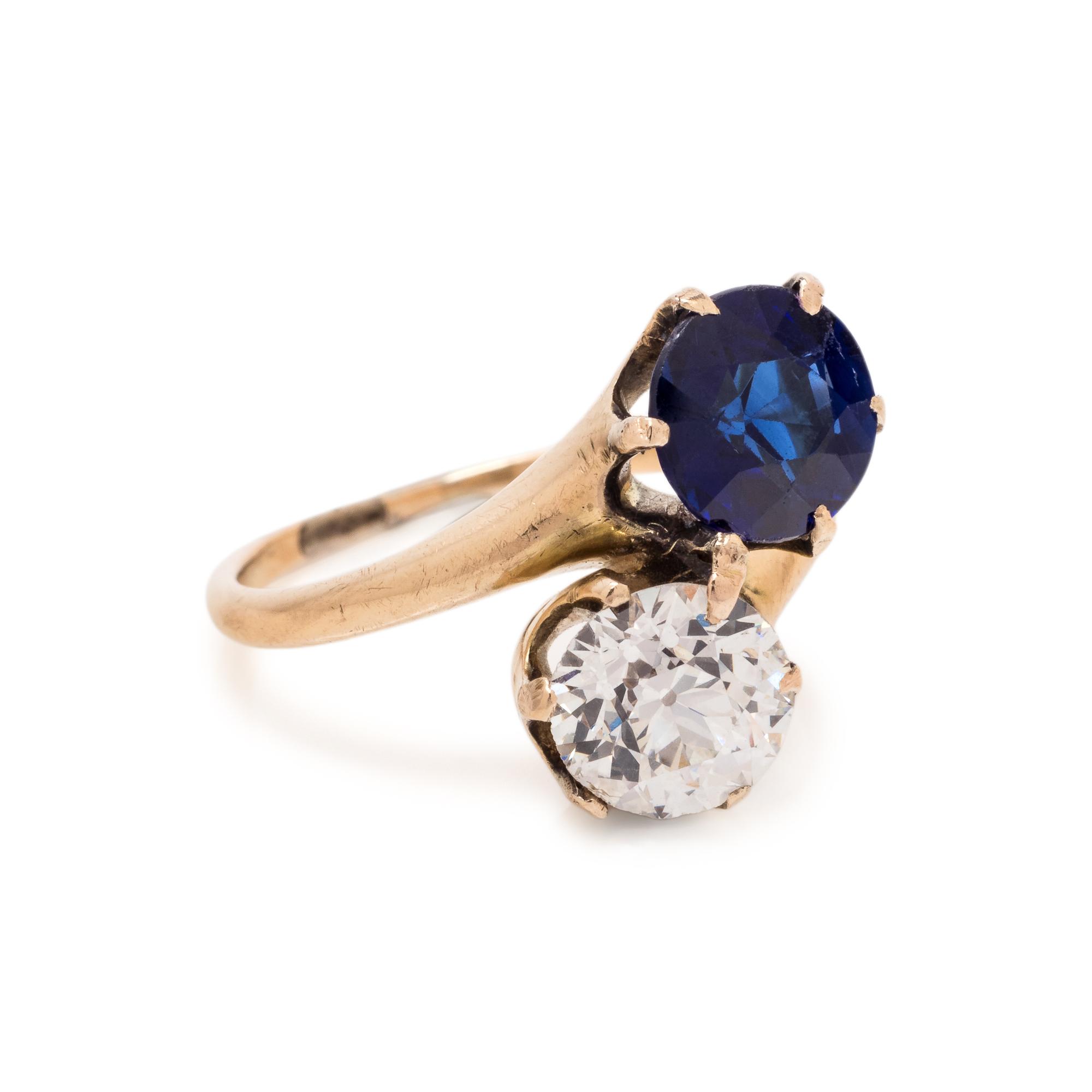 ANTIQUE, DIAMOND AND SYNTHETIC SAPPHIRE 'TOI ET MOI' RING