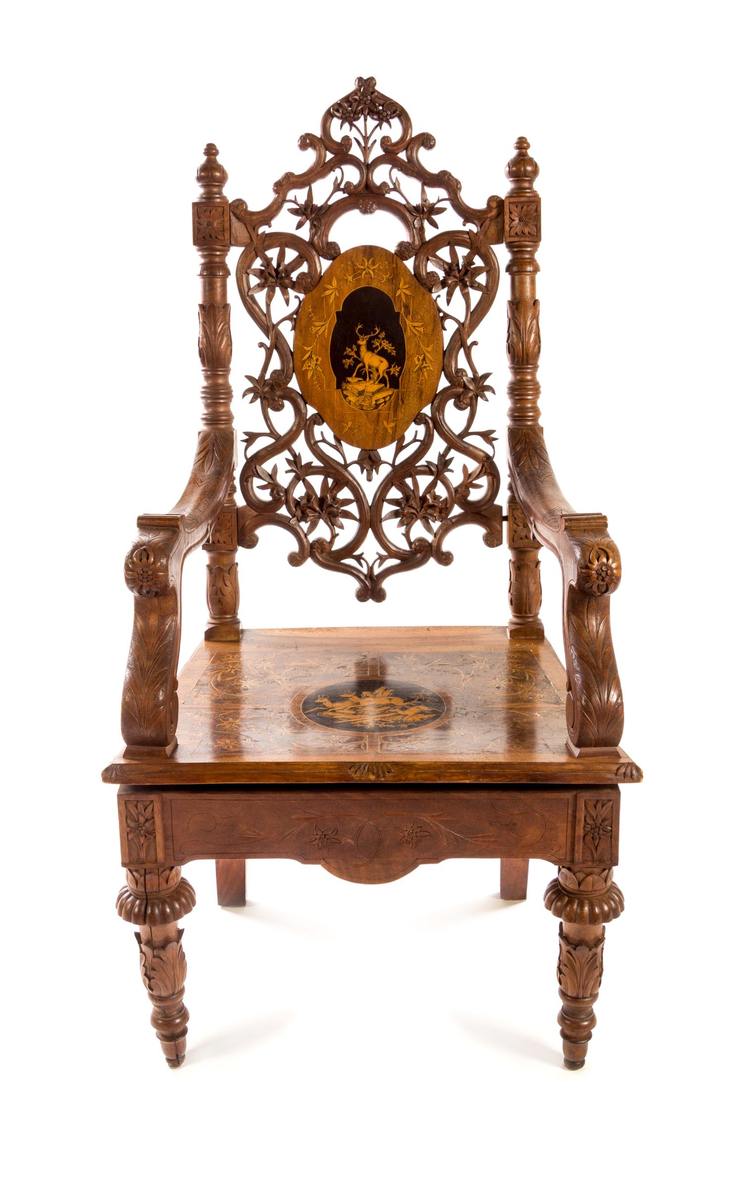 A Black Forest Marquetry Armchair Height 49 3/8 inches. — LATE 19TH CENTURY