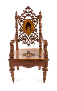 A Black Forest Marquetry Armchair Height 49 3/8 inches. — LATE 19TH CENTURY