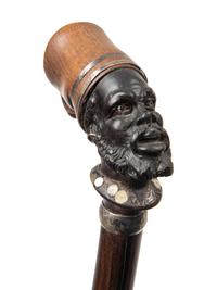 Three Continental Carved Wood Figural Canes
