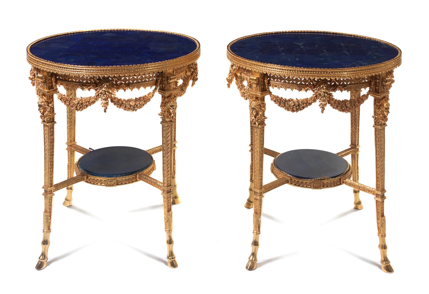A Pair of Louis XVI Style Lapis Lazuli Veneered and Gilt Bronze Mounted Gueridons, Height 31 x diameter 27 1/2 inches.