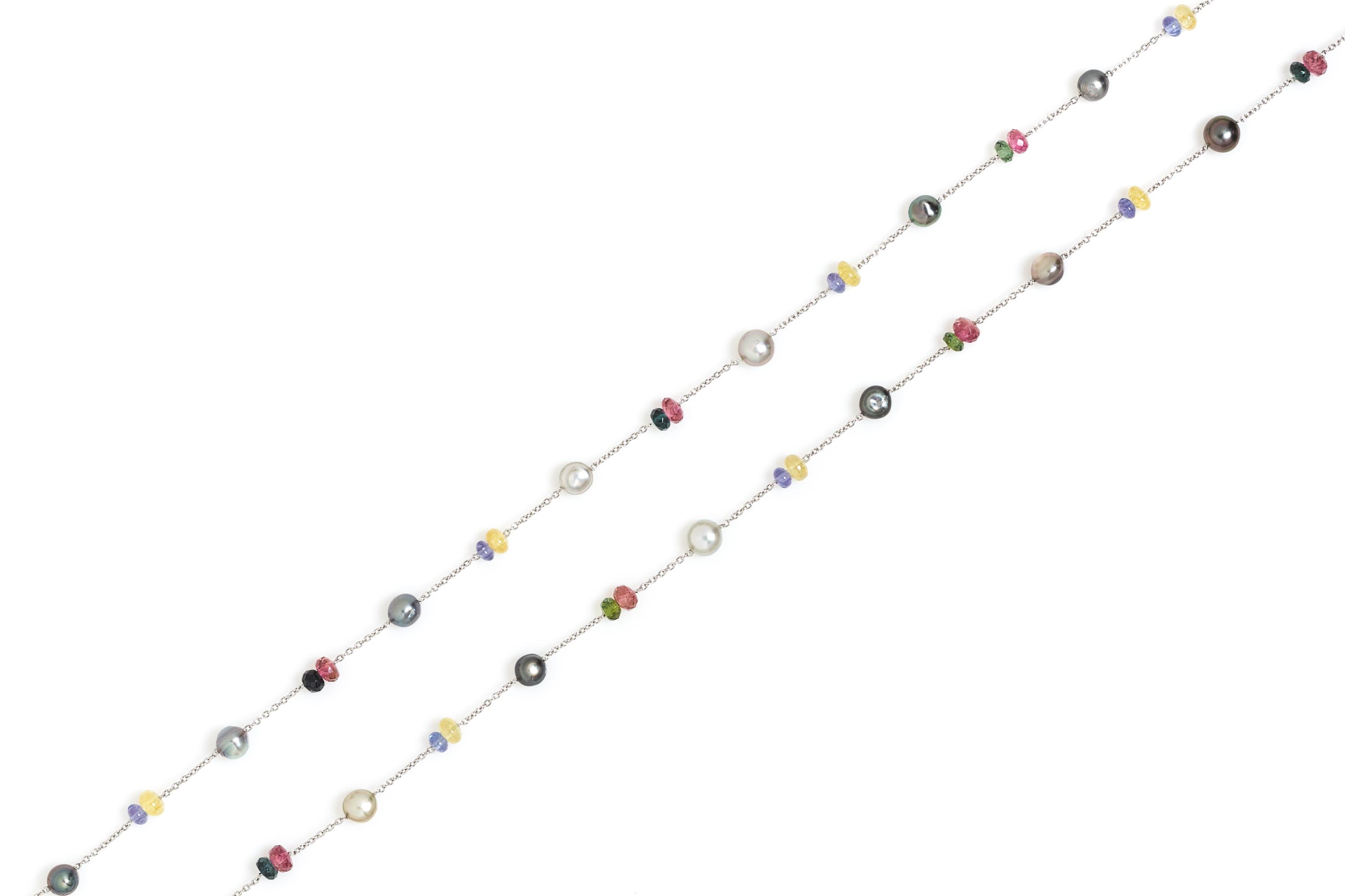 A Platinum, Cultured Pearl and Multigem Longchain Necklace, 14.20 dwts.