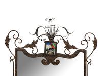 A Whimsical Patinated and Parcel Gilt Metal Framed Mirror