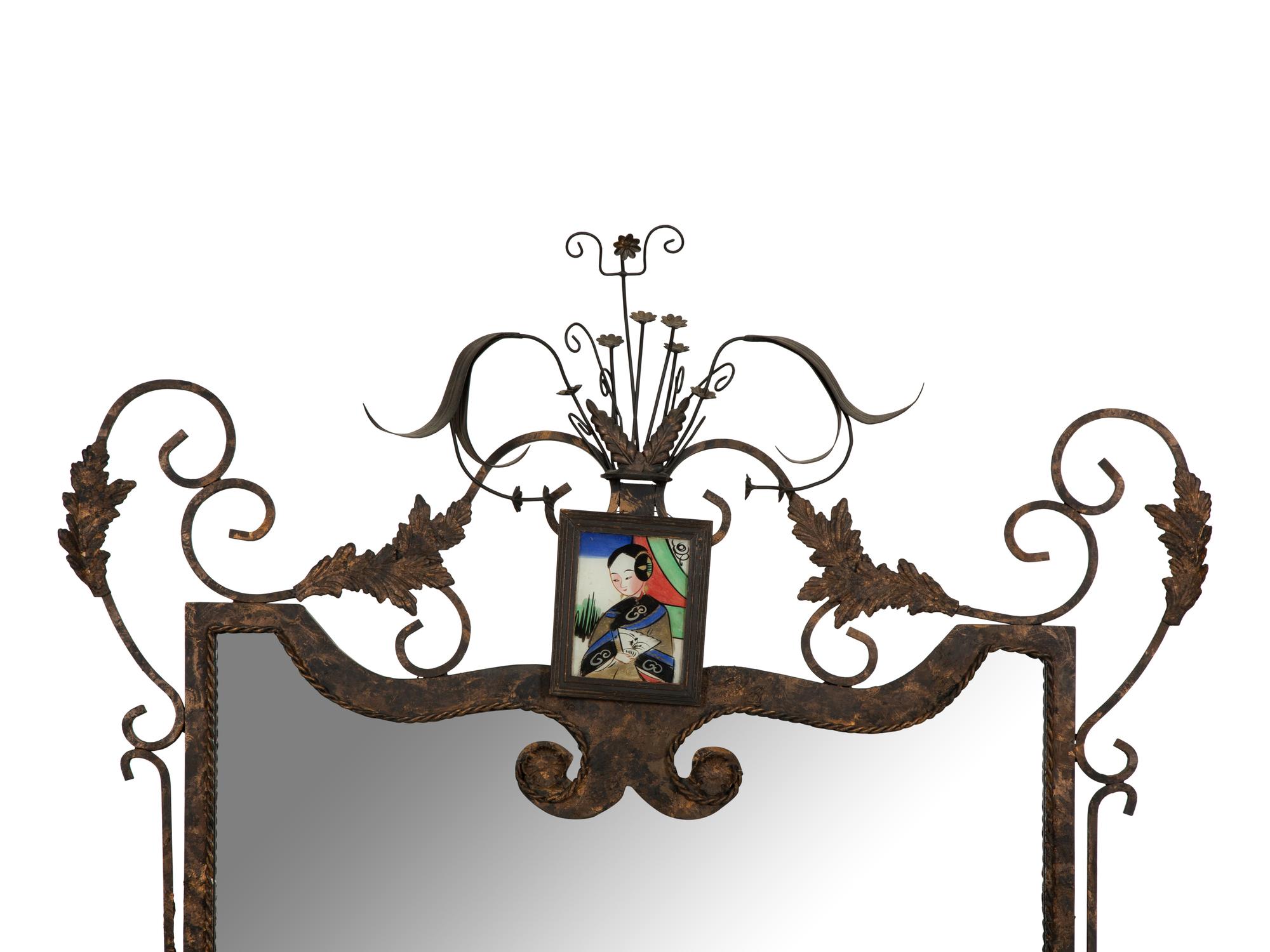 A Whimsical Patinated and Parcel Gilt Metal Framed Mirror