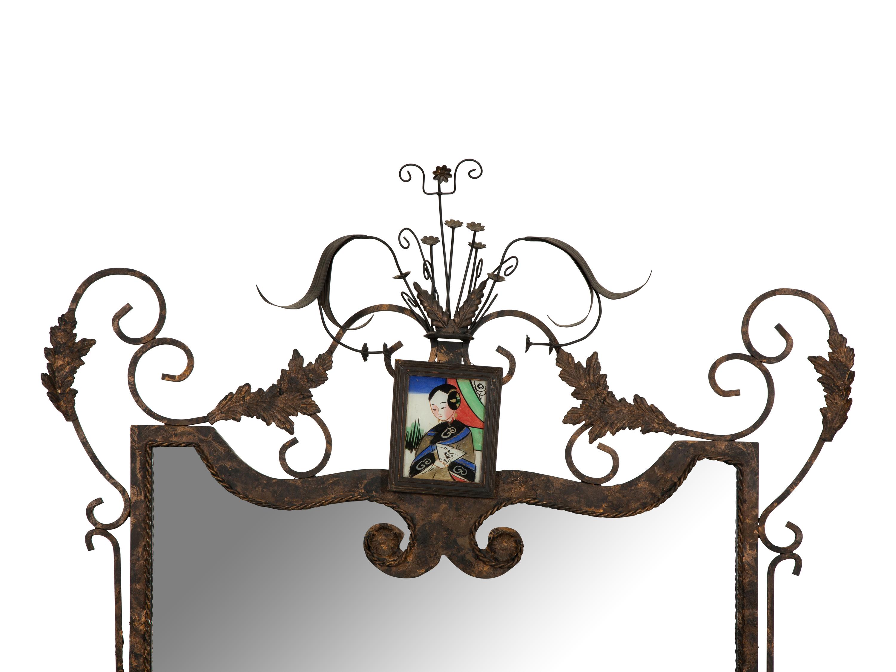 A Whimsical Patinated and Parcel Gilt Metal Framed Mirror