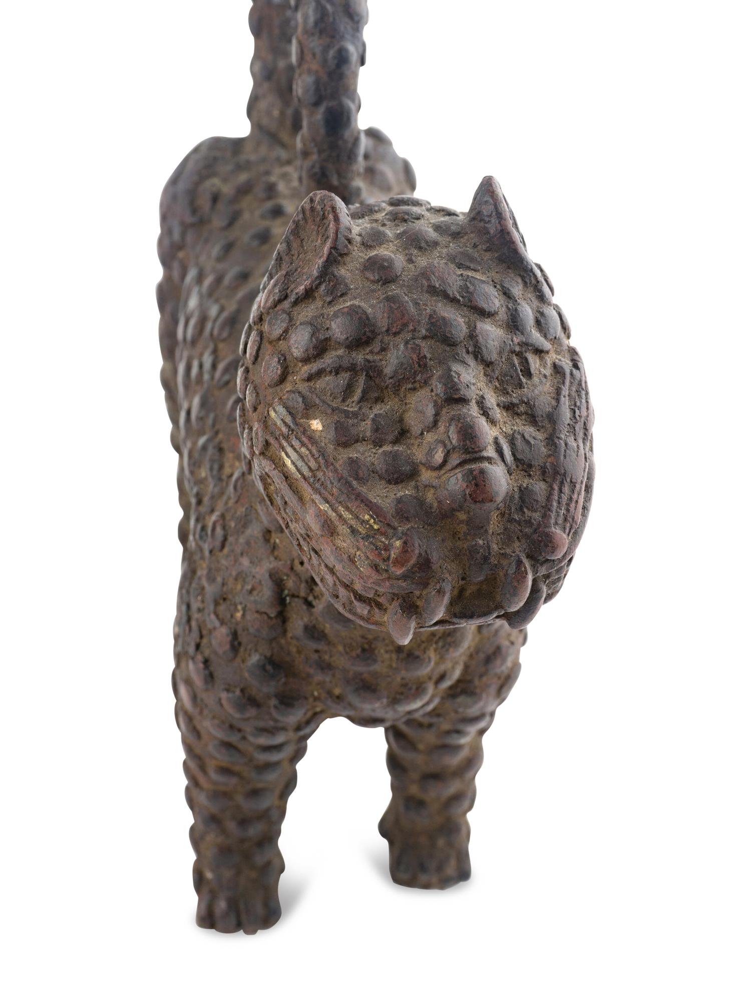 Three African Metal Figures Including a Leopard
