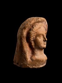 An Etruscan Terracotta Votive Head of a Woman