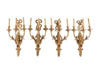 A Set of Eight Louis XVI Style Gilt Bronze Three-Light Sconces
