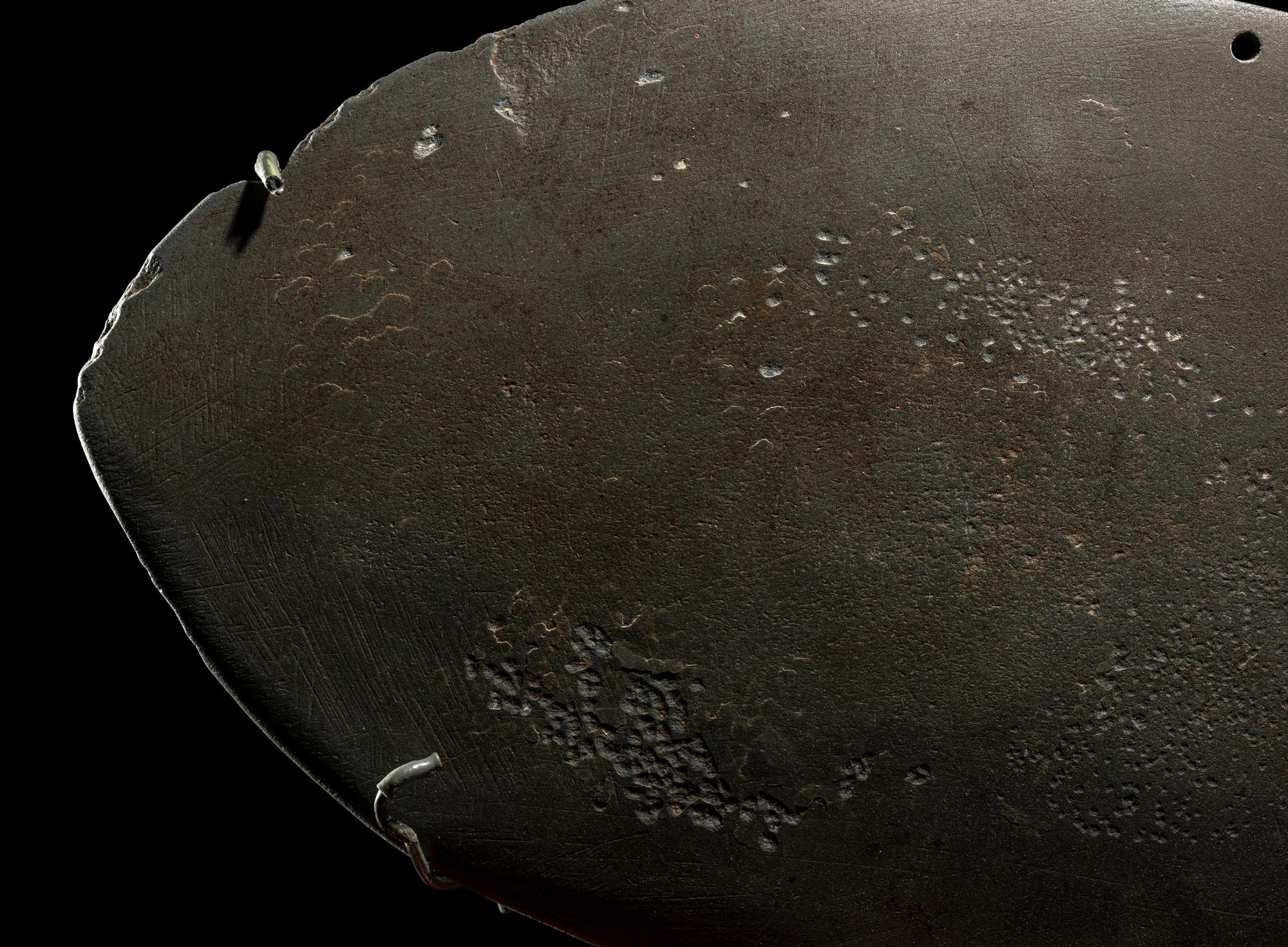An Egyptian Greywacke Cosmetic Palette in the Form of a Bird