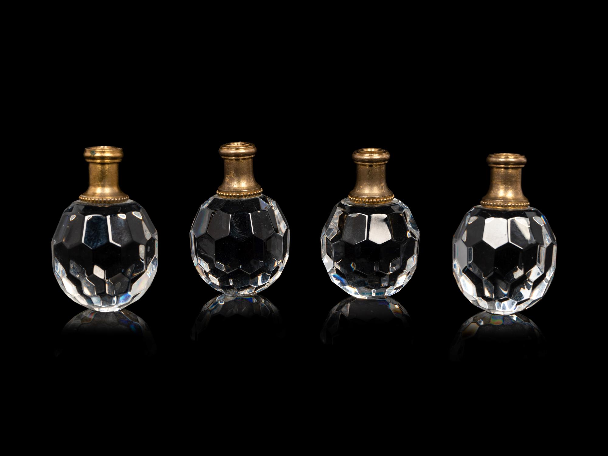 A Set of Four Waterford Cut Glass Lamp Finials