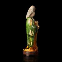 A very rare Chinese small sancai-glazed pottery figure of a woman and baby 珍罕仕女抱婴唐三彩 Tang dynasty ?