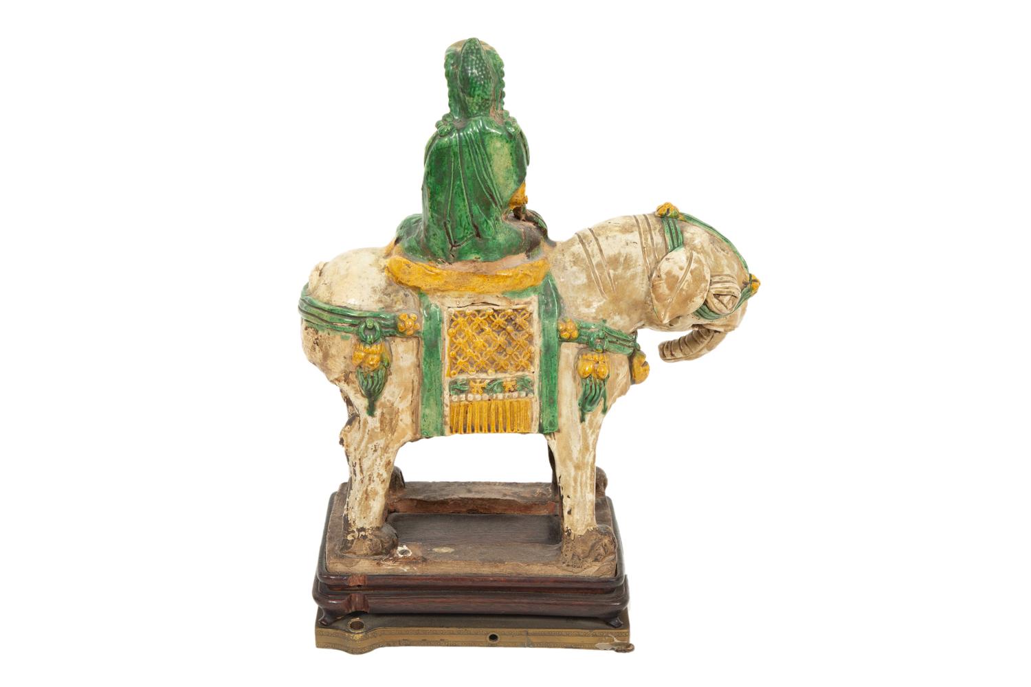 A Chinese Sancai Glazed Ceramic Elephant with a Seated Figure