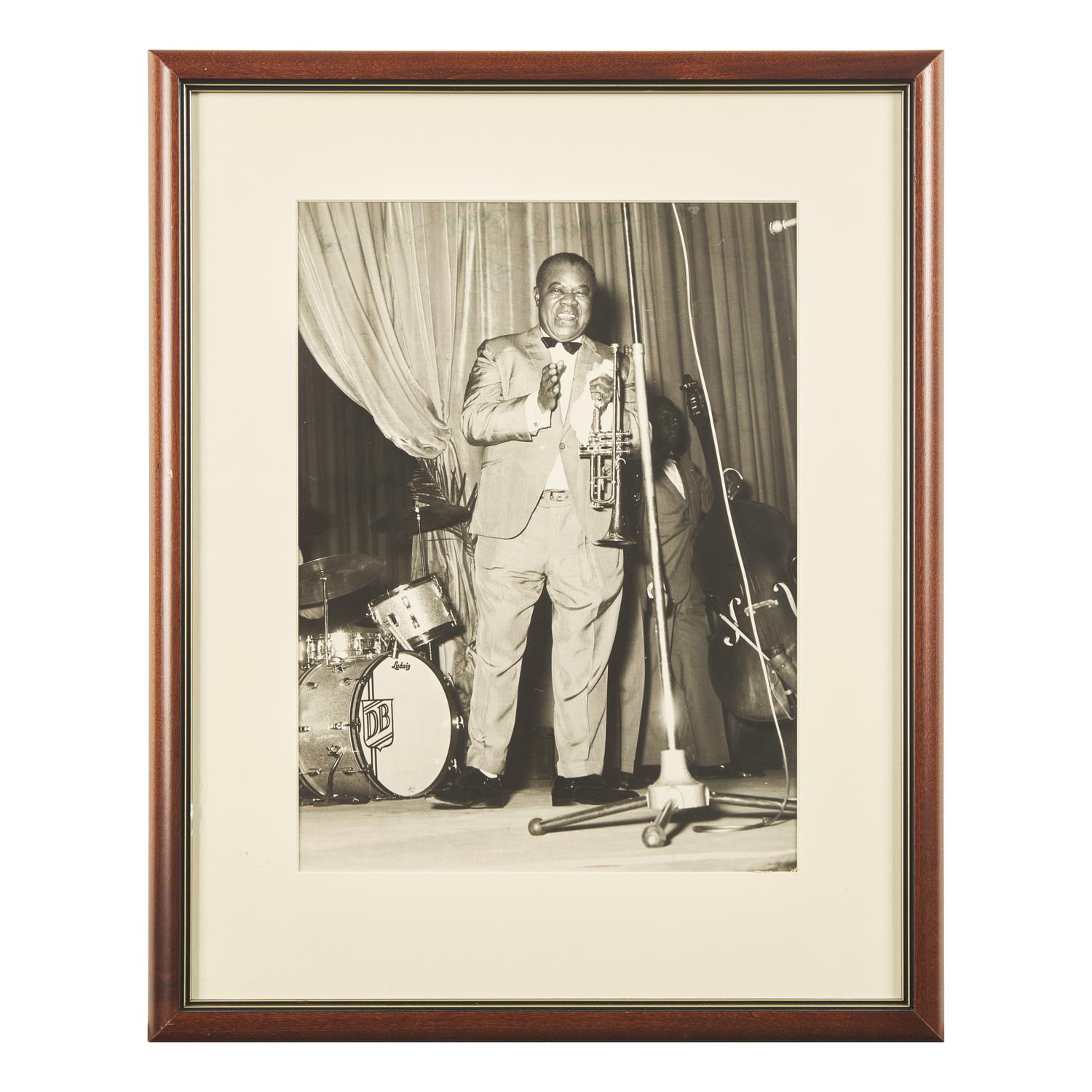 [African Americana] Armstrong, Louis. Inscribed Photograph