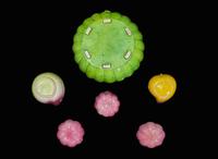 A group of six assorted Chinese enameled peach and melon-form covered sweetmeat boxes and ornaments 瓜果形瓷器一組六件