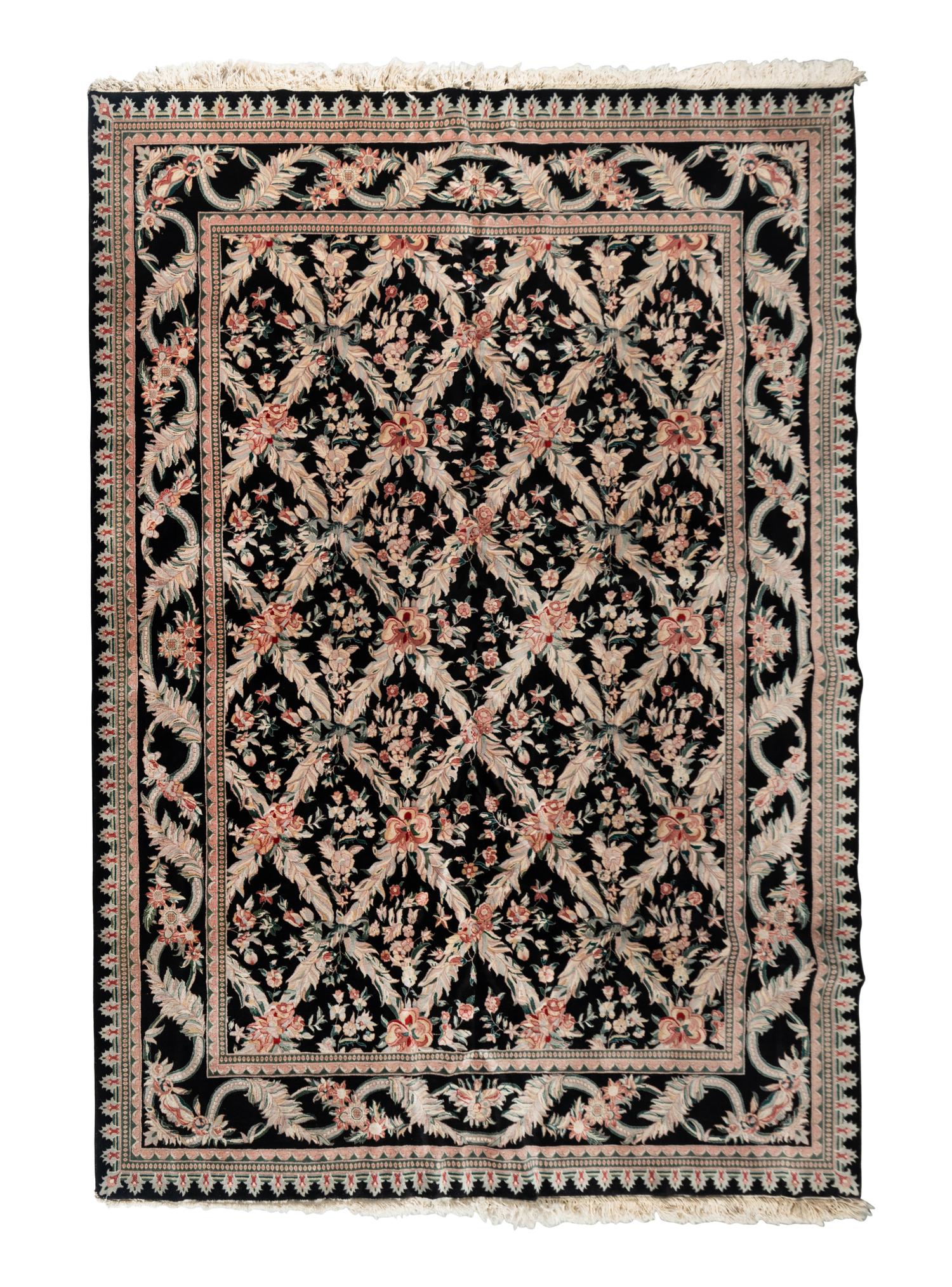An Indo-Kashan Wool Rug