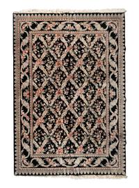 An Indo-Kashan Wool Rug