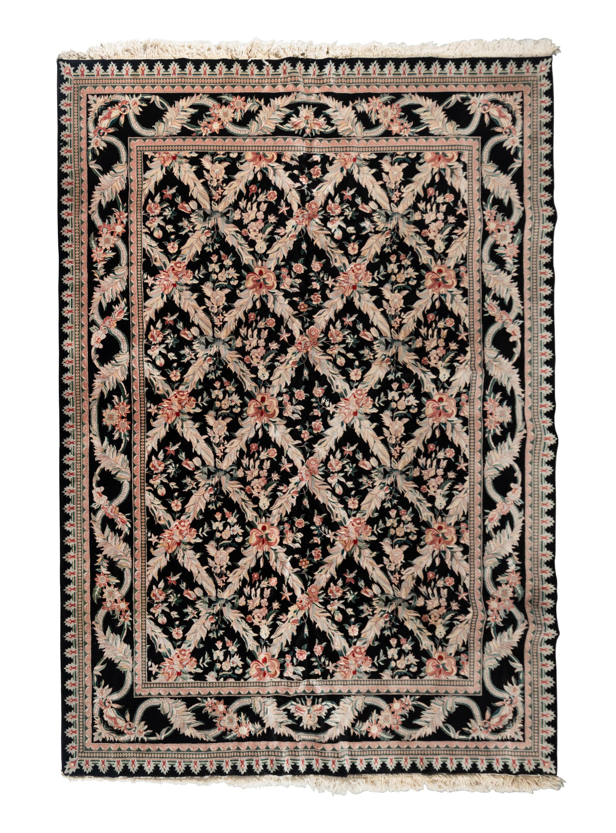 An Indo-Kashan Wool Rug