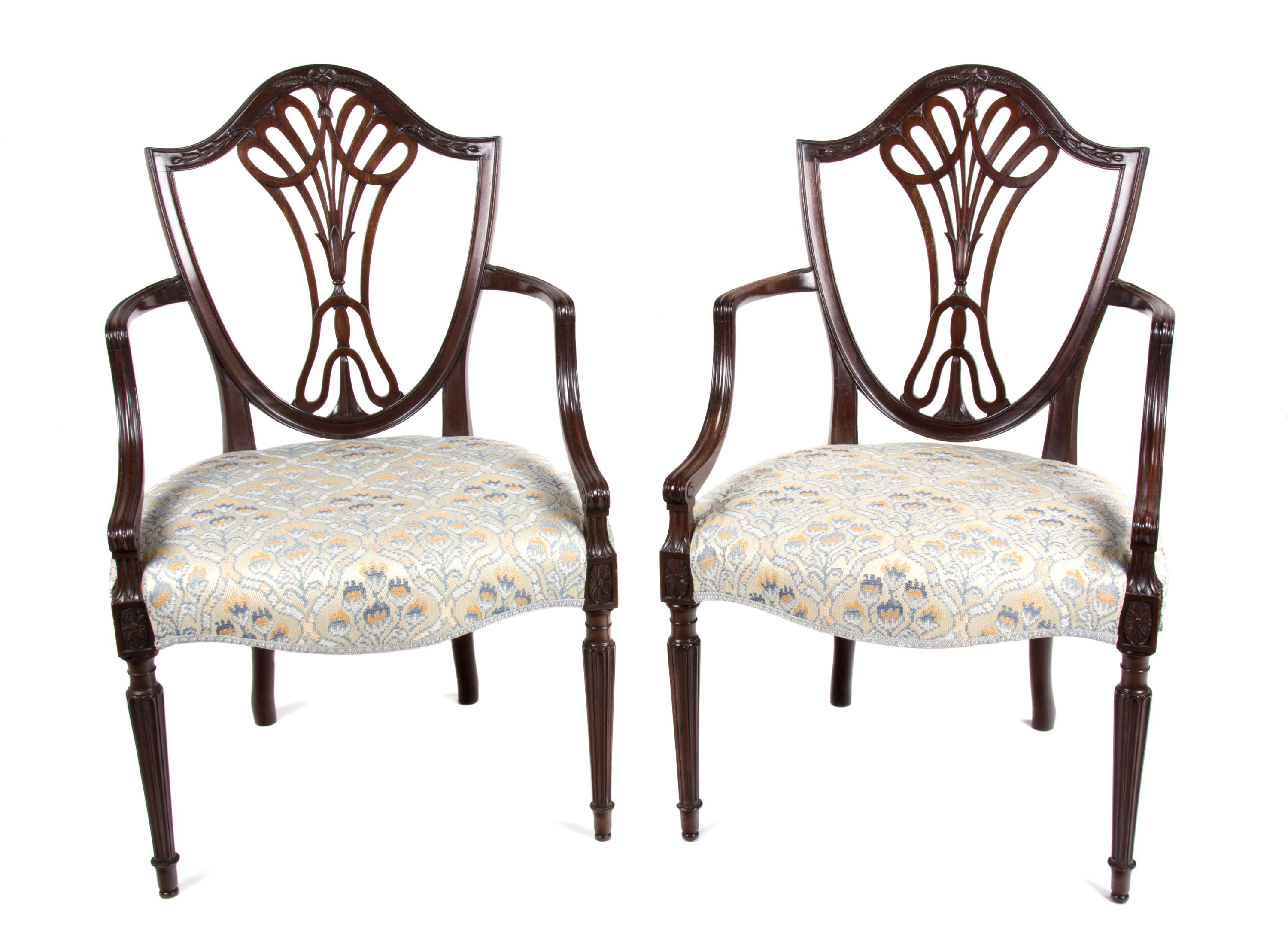 A Pair of Hepplewhite Style Mahogany Open Armchairs Height 36 1/2 inches. — 19TH CENTURY