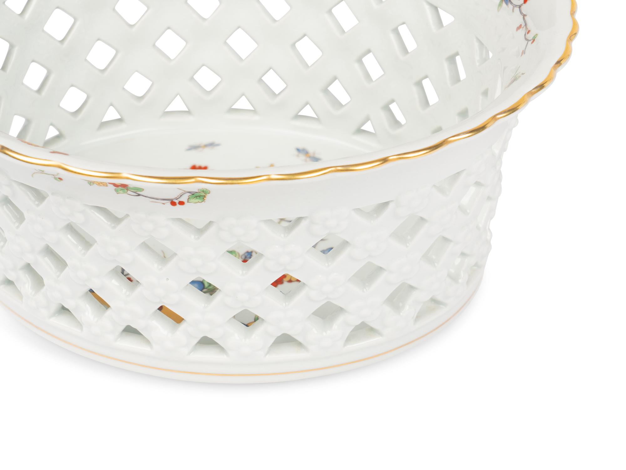 A Mottahedeh Porcelain Pitcher and Centerpiece Basket
