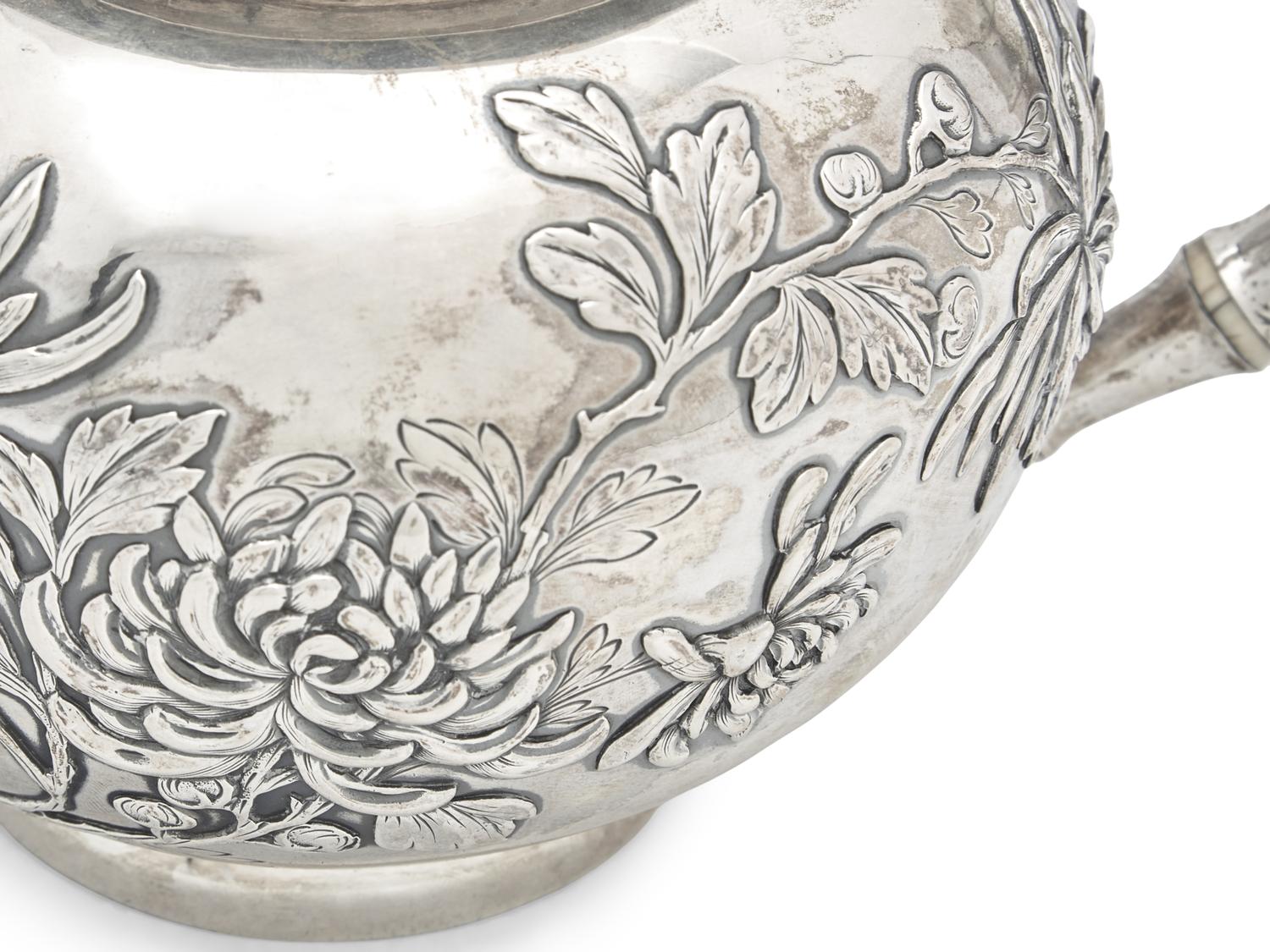 A Chinese Silver Five-Piece "Chrysanthemum" Repousse Tea and Coffee Service