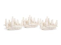 A Set of Three Contemporary Bisque Porcelain Candelabra