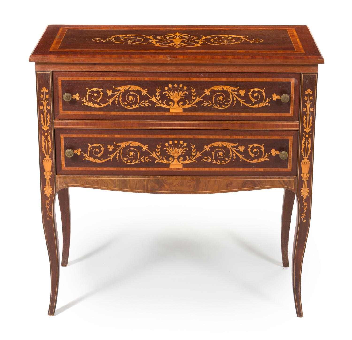 An Italian Mahogany and Fruitwood Inlaid Marquetry Commode, Height 31 1/2 x width 53 x depth 20 inches.