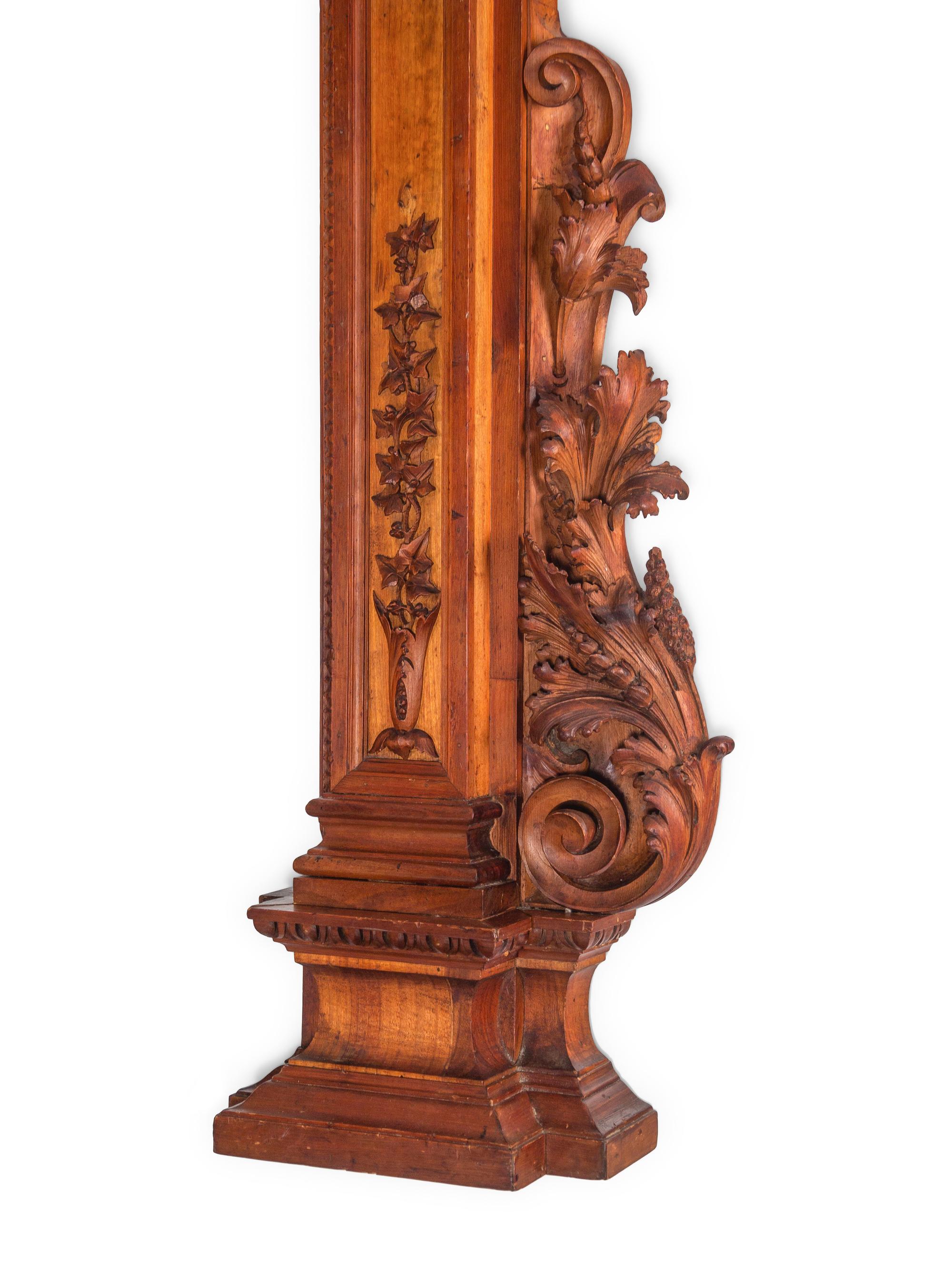 A Pair of Continental Carved Walnut Pilasters