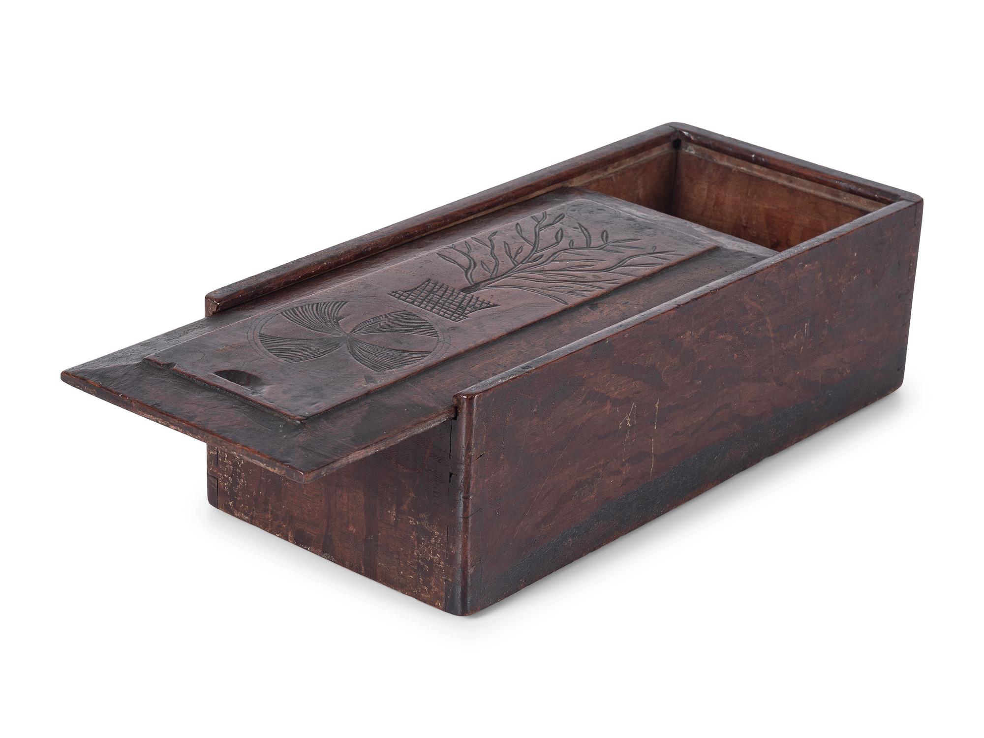A Thistle Carved Oak Slide-Lid Candle Box