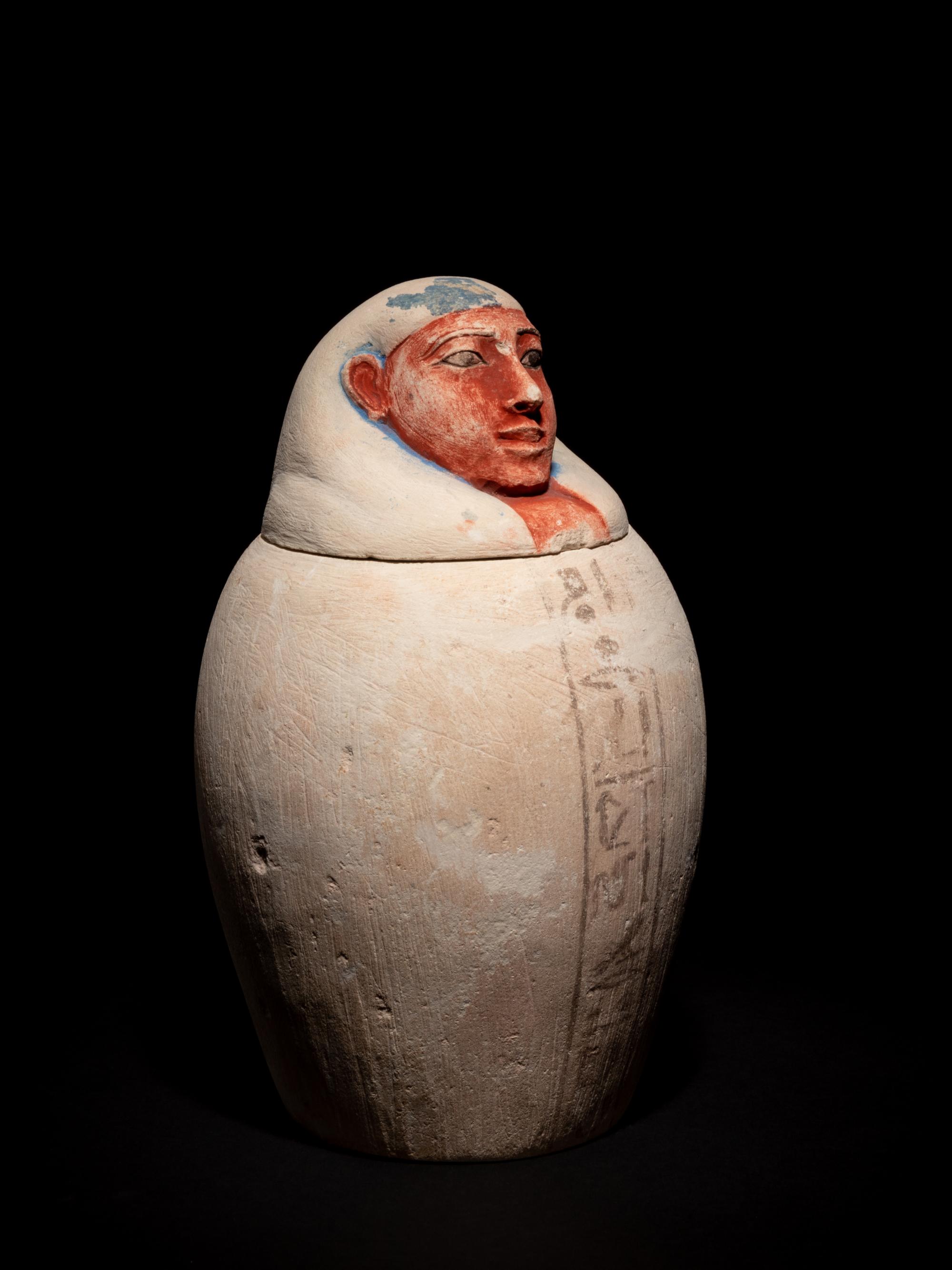 A Set of Four Egyptian Painted Limestone Canopic Jars of the Sons of Horus