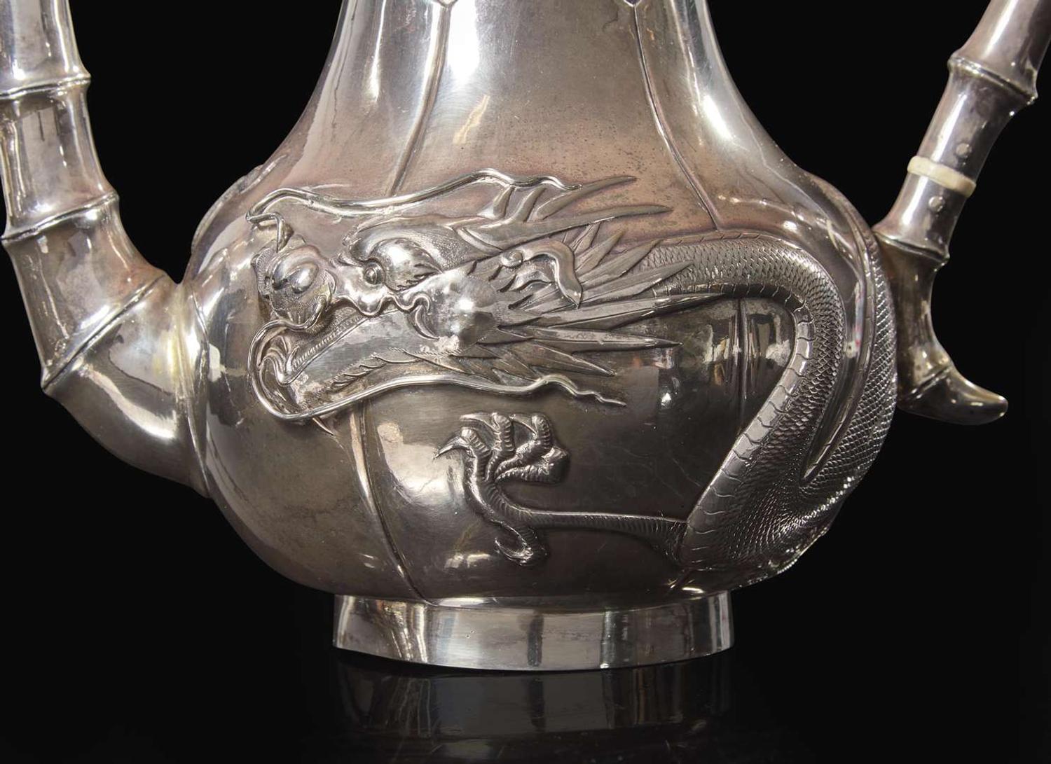 A Chinese export silver five-piece "Dragon" tea and coffee service and tongs, mark of Zeewo, Shanghai, late 19th to early 20th century 一組五件銀質咖啡器及茶具 Zeewo款 上海 十九世紀末至二十世紀初