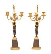 A Pair of Empire Style Gilt and Patinated Bronze Figural Candelabra