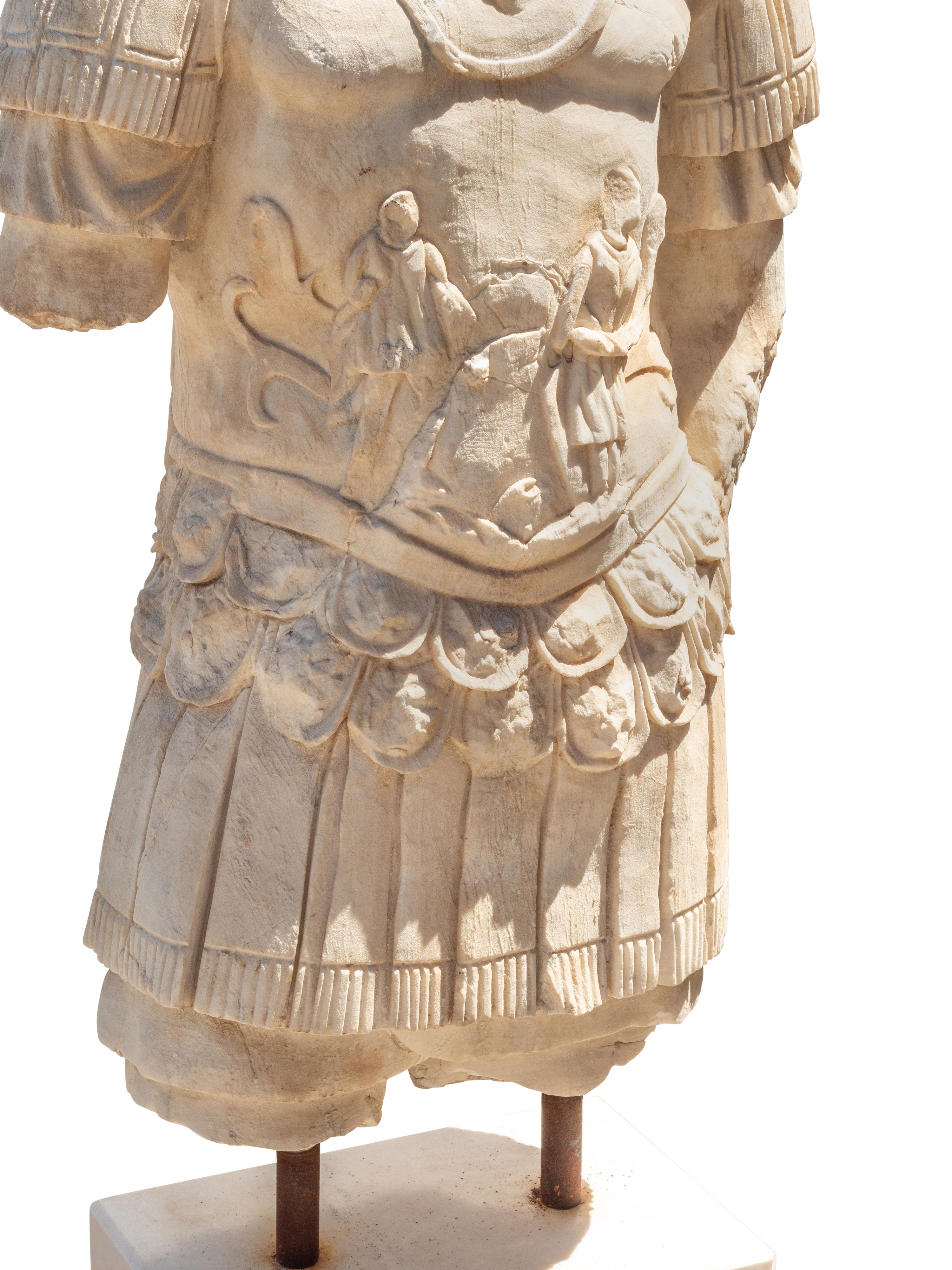 An Italian Carved Marble Torso on Stand
