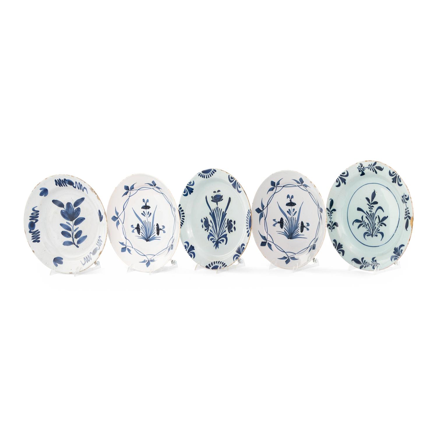 A Collection of Five Delft Blue and White Decorated Plates