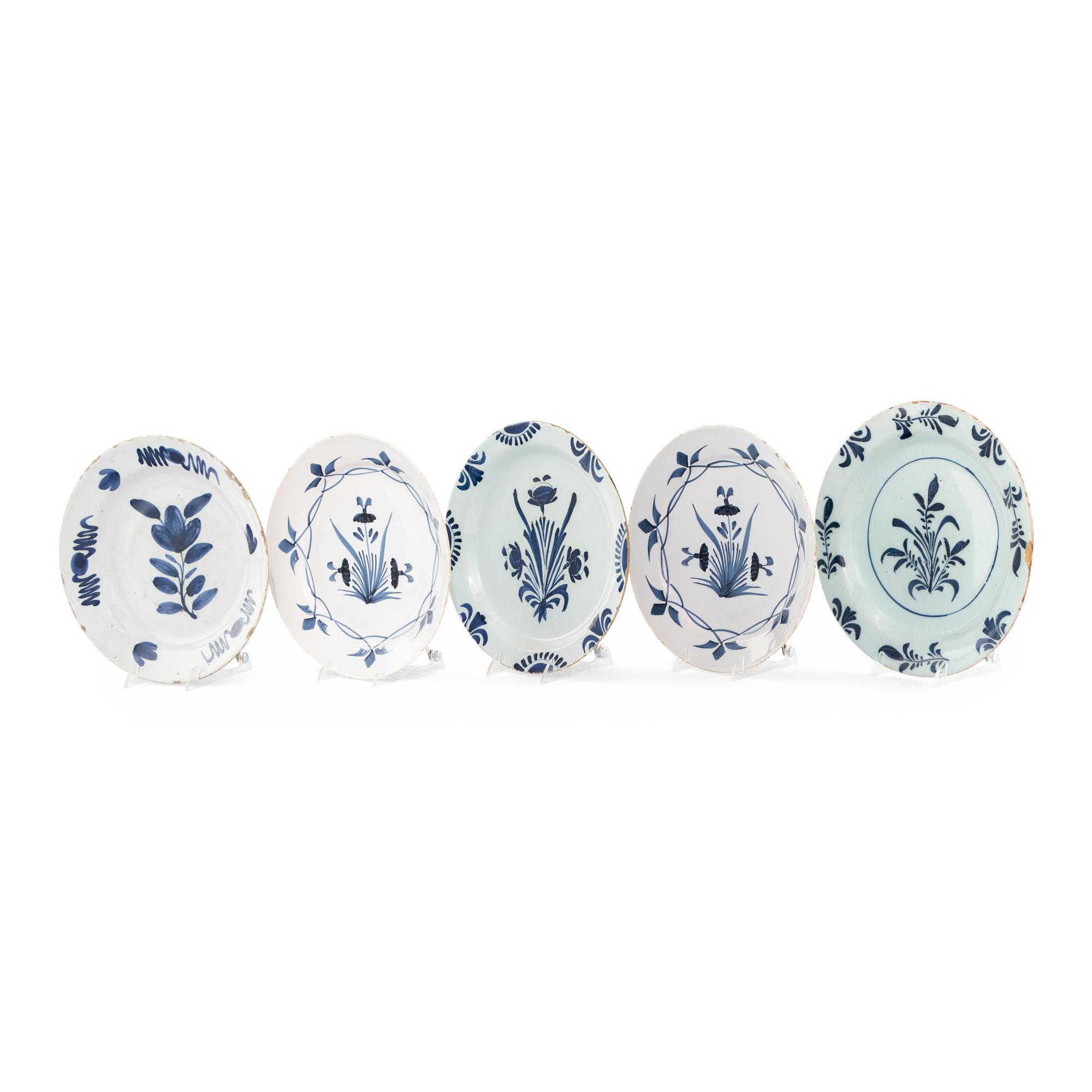 A Collection of Five Delft Blue and White Decorated Plates