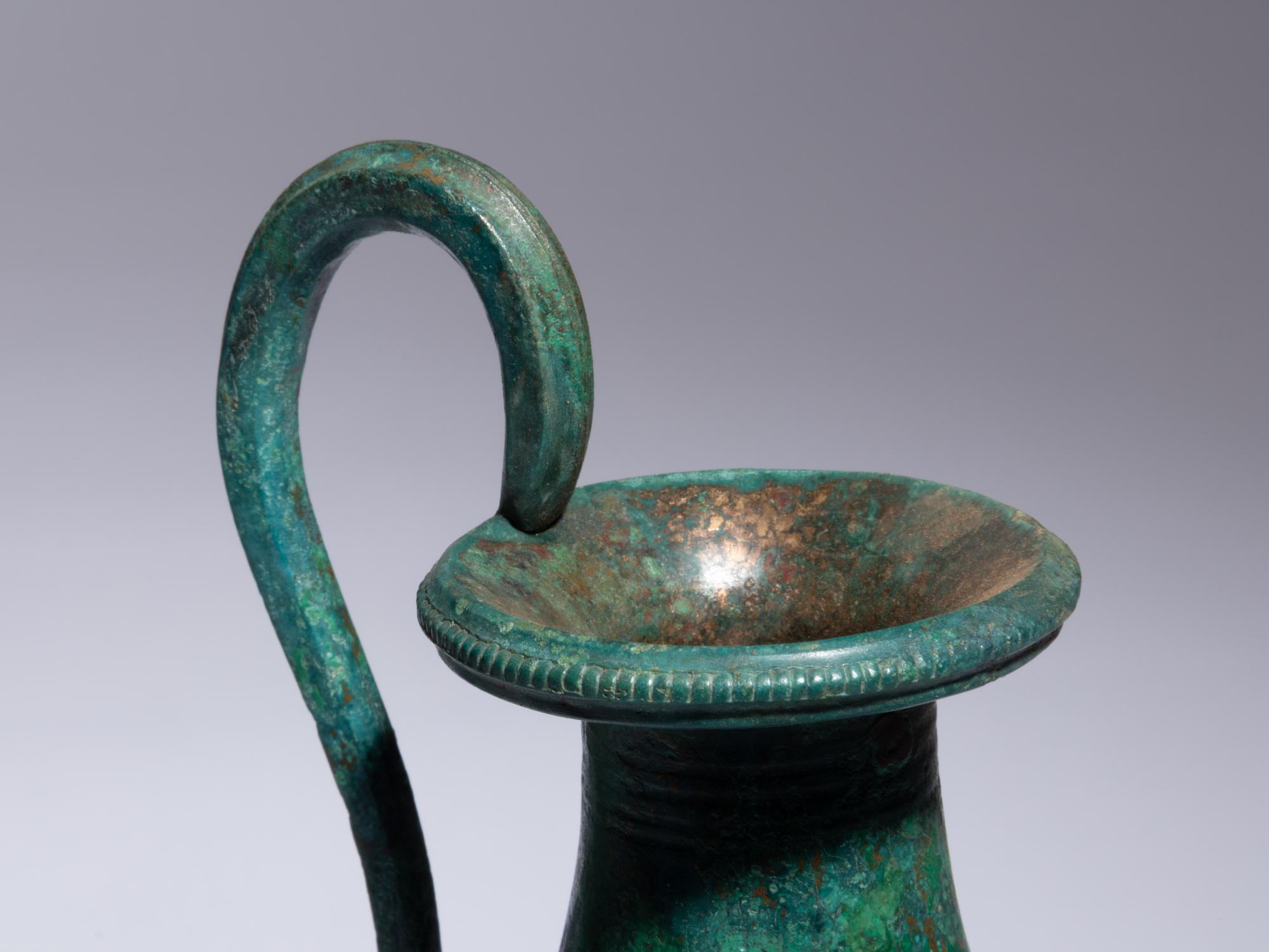A Pair of Etruscan Bronze Olpai