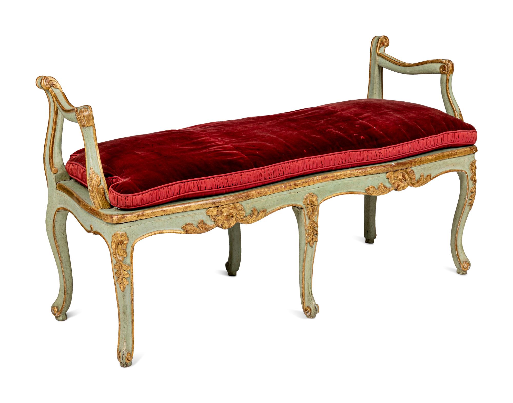 A Pair of Louis XV Green-Painted and Parcel-Gilt Cane Seat Window Benches