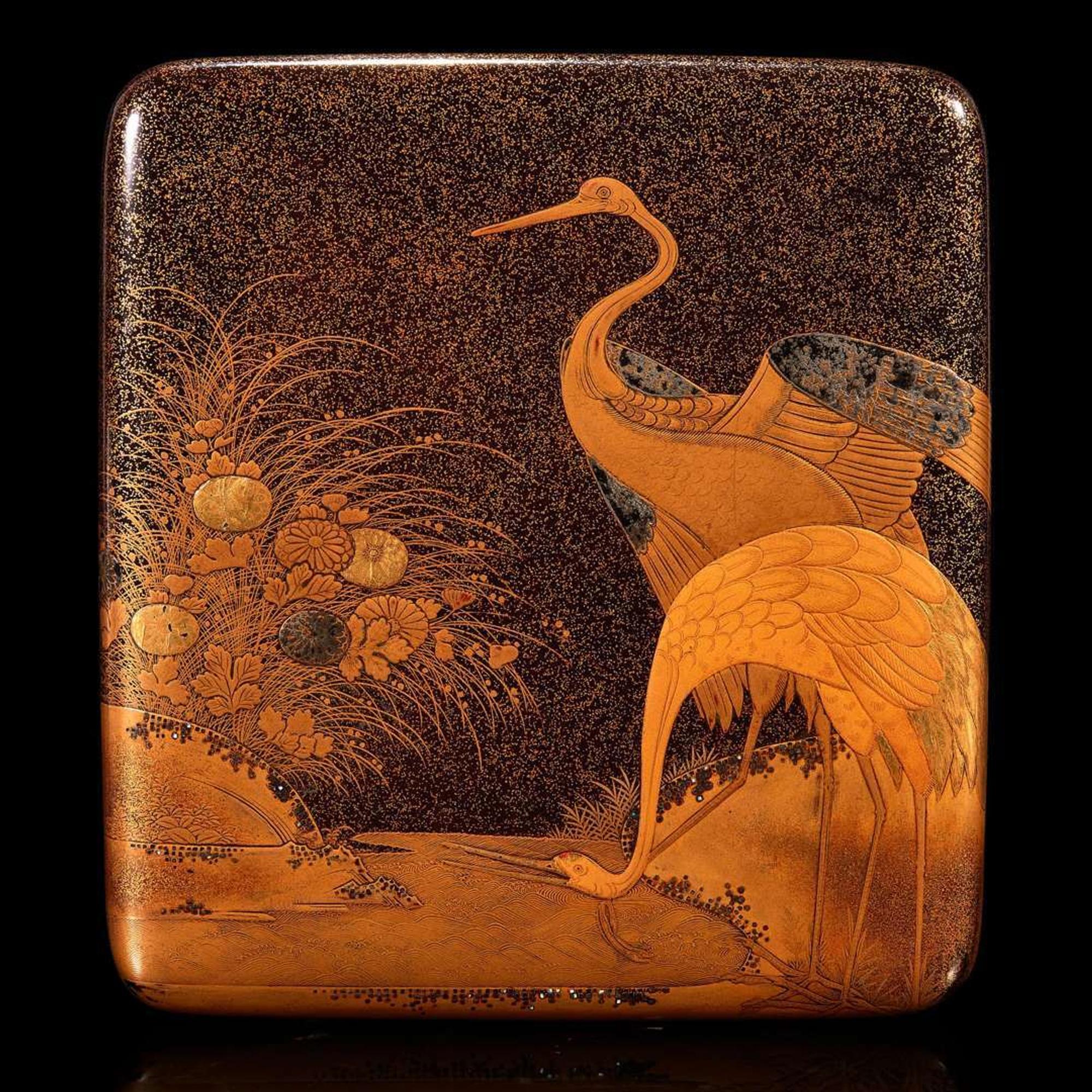 A Japanese lacquer "Cranes and Dogs" writing box Edo to early Meiji period