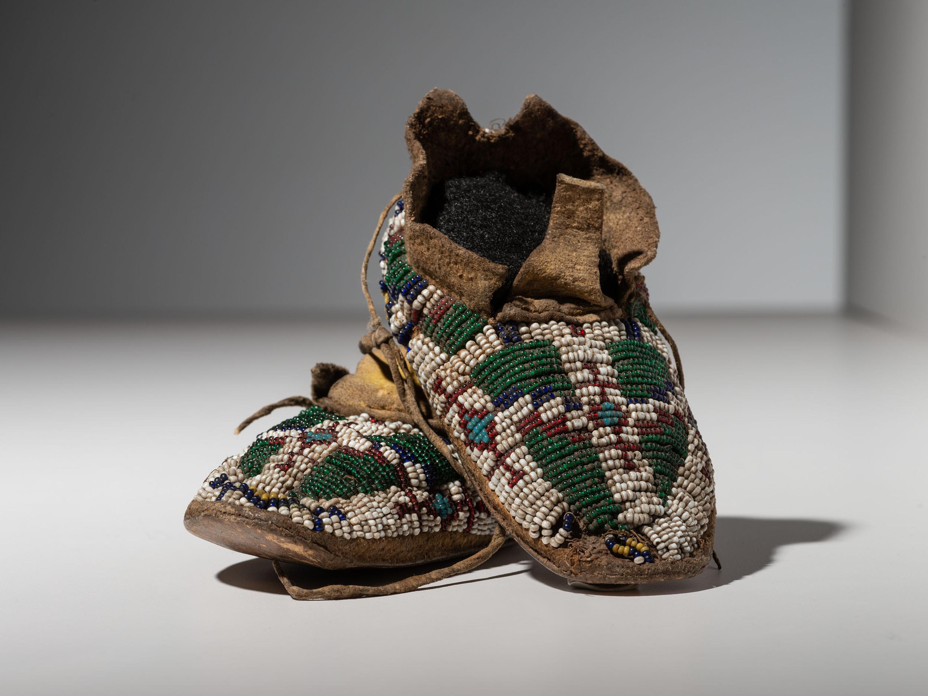Cheyenne Child's Beaded Buffalo Hide Moccasins