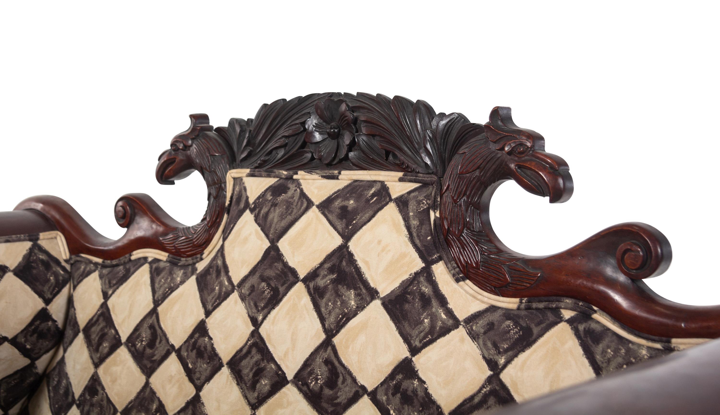A Classical Carved and Figured Mahogany Settee