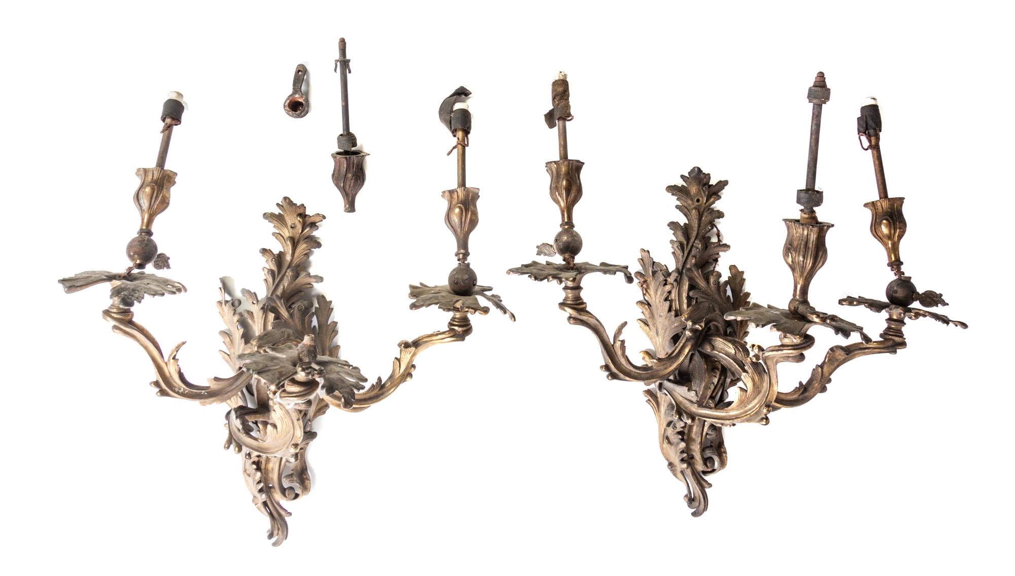 A Pair of Louis XV Style Bronze Three-Light Sconces, Height 16 1/4 inches.