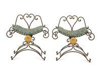 A Pair of Painted and Parcel Gilt Iron Curule Stools with Tufted Cushions