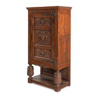 A Baroque Style Carved Oak Cabinet